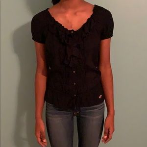 Cute and flirty navy blue top!